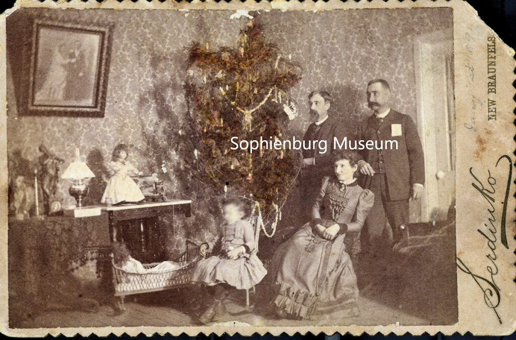 Photo: Christmas at the Serdinkos, 1891. Left to right: Rosa Lee Serdinko, J.C. Reich, Ernestine Serdinko, John Serdinko. (Sophienburg Archives P0181-89A)