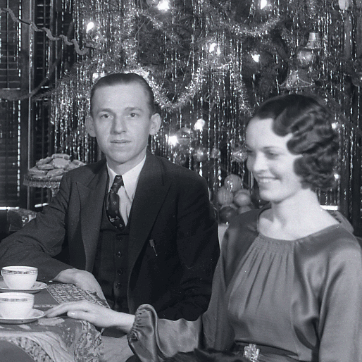 Photo: Alfred Schalausky Family with lighted Christmas tree, 1932.