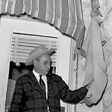 Sheriff Walter Fellers holding the escape "rope" attached to the Comal County Courthouse gutter on Jan. 1, 1963.