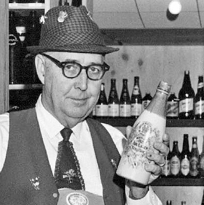 Photo Caption: Jerome Nowotny with his "Beer Bottles of the World" collection in 1970.
