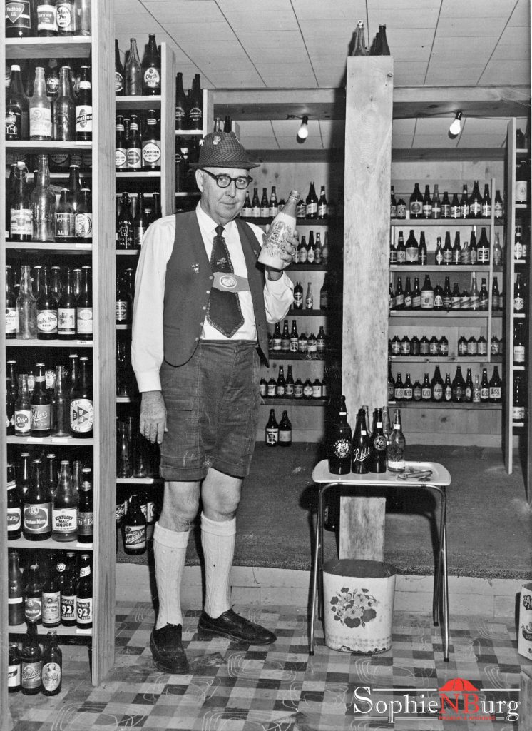 Photo Caption: Jerome Nowotny with his "Beer Bottles of the World" collection in 1970.