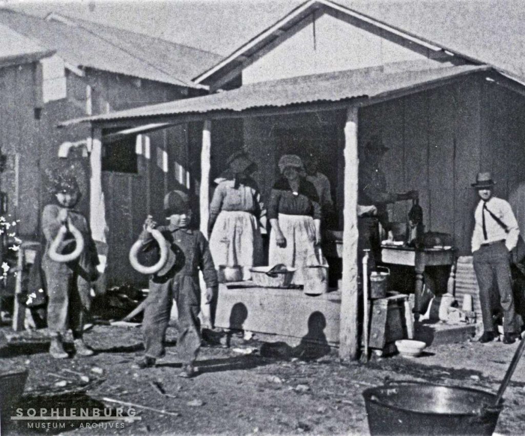 PHOTO CAPTION: Family involved in making sausage (Sophienburg Museum and Archives).