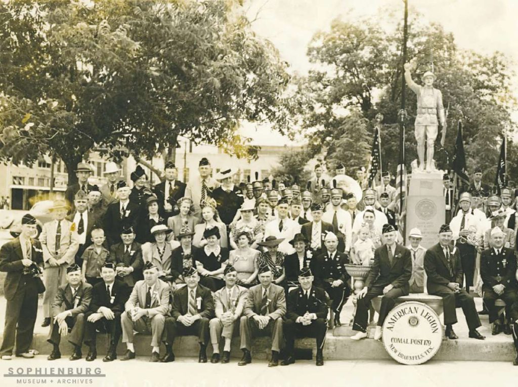 PHOTO CAPTION: Pictured is the 1940 American Legion District Convention held in New Braunfels. Participants stand in front of the "Spirit of the American Doughboy" statue.