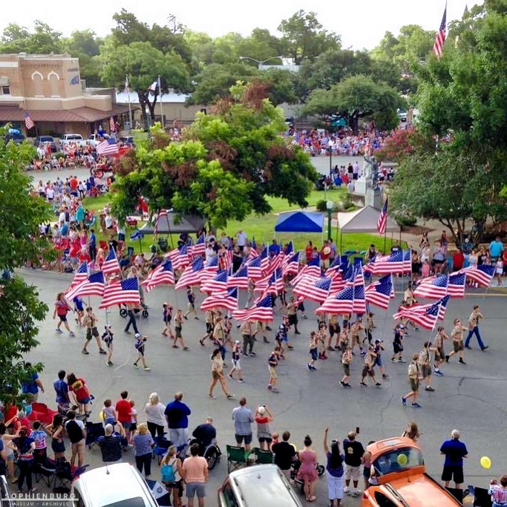 CAPTION: Boy Scouts of Aamerica Troop 133 flag detail at recent Sophienburg Museum and Archives Ol’ Fashion Fourth of July Parade and Program.